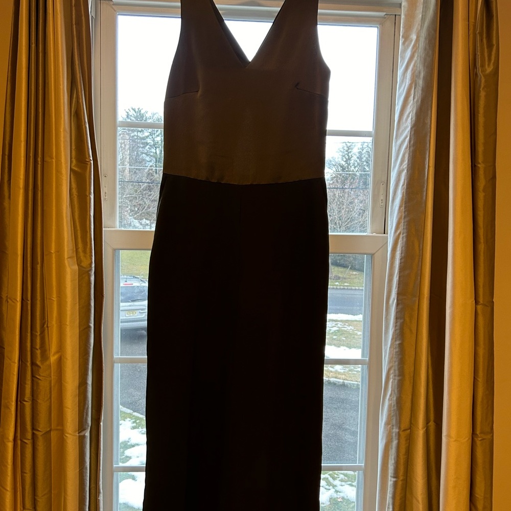 Fun and sophisticated pant suit with surprising back detail.